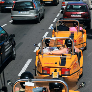 Barcelona, Spain - BARCELONA september 2010. Yellow GoCar. Go Car Barcelona is an entirely new way to explore Barcelona in a little yellow talking tour car that you drive around Barcelona following instructions from the car itself, a GoCar is more than just fun.Best of all, the adventure happens at your pace. You can stop for photos, grab a coffee or stop for lunch. The advanced navigational capabilities of the GPS deliver an informative tour, high-lighting all the great sights throughout Barcelona as you drive.