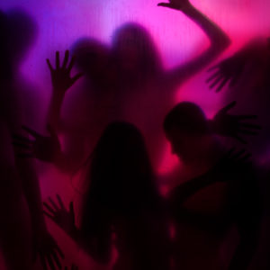 Group of people behind the transparent curtain having love and sex activity
