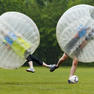 Bubble football in funny moment. Concept: Fun, Sport Flying