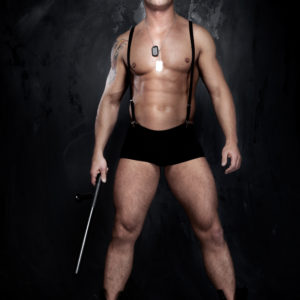 Conceptual photo of young, sexy and good looking police officer, almost naked.