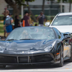 Photo of a black Ferrari on Ocean Drive Miami Beach FL