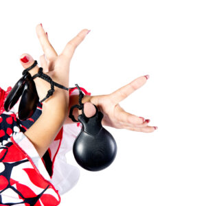 Hands detail of Flamenco dancer in beautiful dress on white background